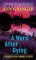 A Word After Dying : A Meredith and Markby Mystery cover